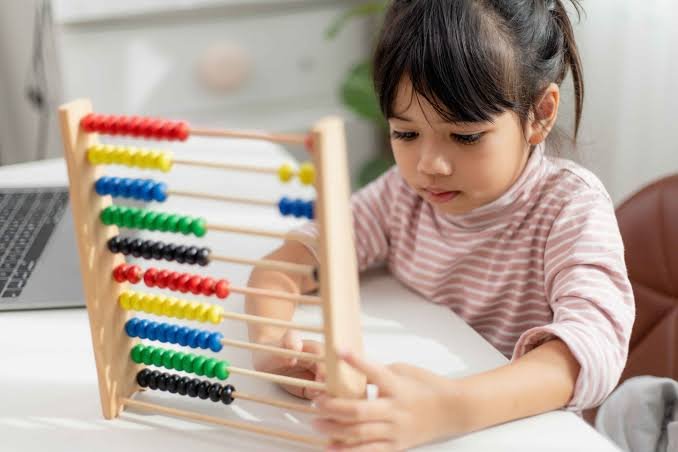 a child practise abacus calculations at home