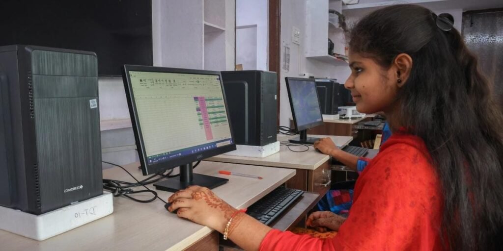 Beginner students learning computers at a training institute in Madurai