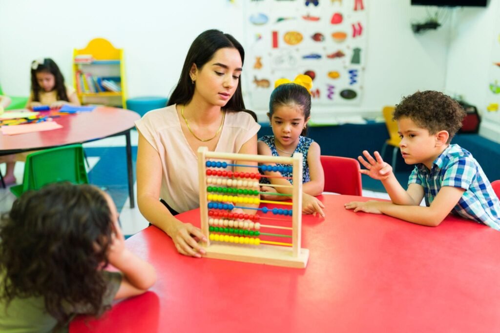 Child learning number recognition using a colourful abacus