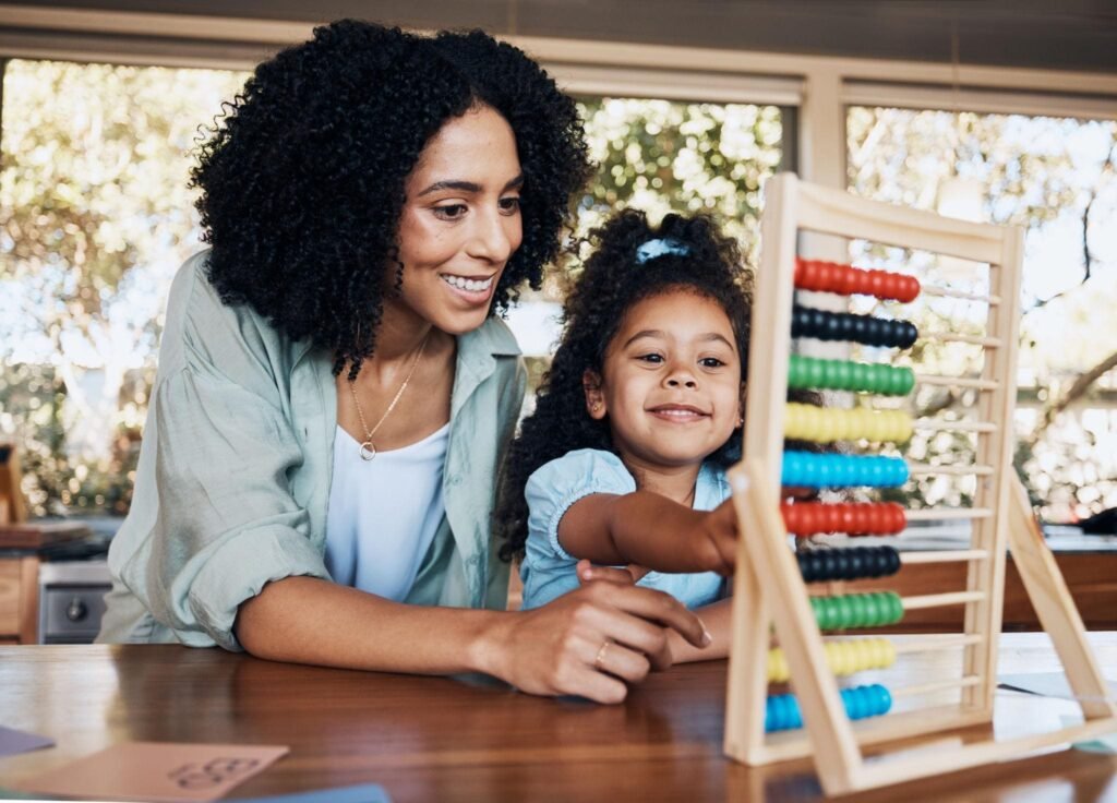 Child practising arithmetic with an abacus to build calculation skills